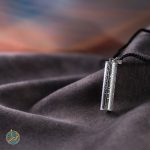 حرز امام جواد (ع) روی پوست آهو با قاب نقره بازوبندی و گردن آویز
